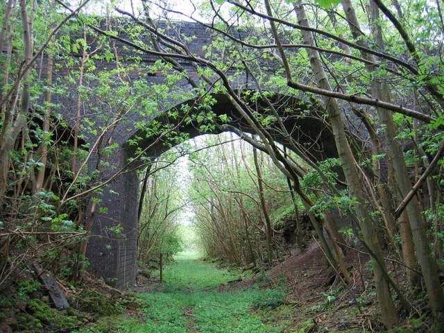 Railway Bridge over Notgrove Railway Cutting. This bridge crosses the dismantled Banbury and Cheltenham Direct Railway just west of Notgrove. It is now a Site of Special Scientific Interest because of the Jurassic limestones exposed here.