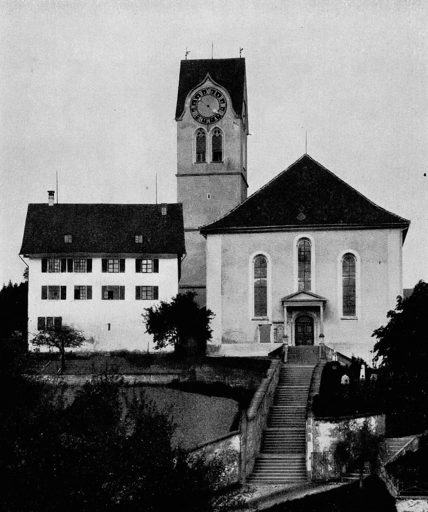 Reformirte Kirch mit altem Pfarrhauße zů Hinwil im Zürichbiet, von Weſten geſehn.