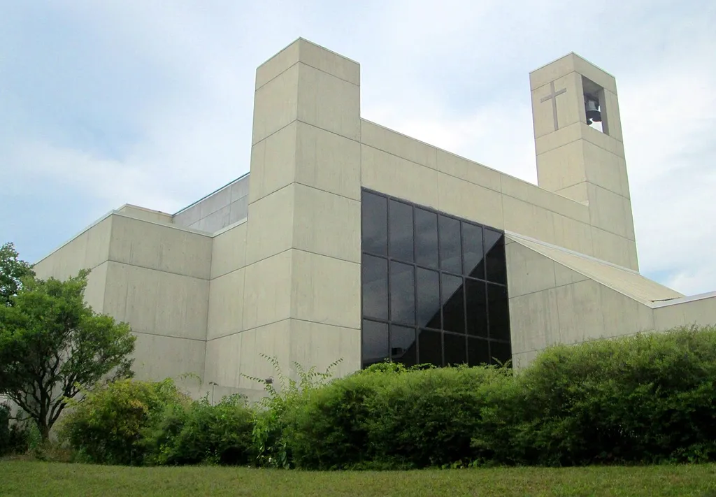 The Episcopal Cathedral Church of St. Paul at 2 Cherry Street on the corner of Battery Street in Burlington, Vermont was built in 1973 and was designed by Burlington Associates (now known as TruexCollins). It replaced an earlier cathedral which was burned down by arson in 1971. (Sources: [1] and [2])