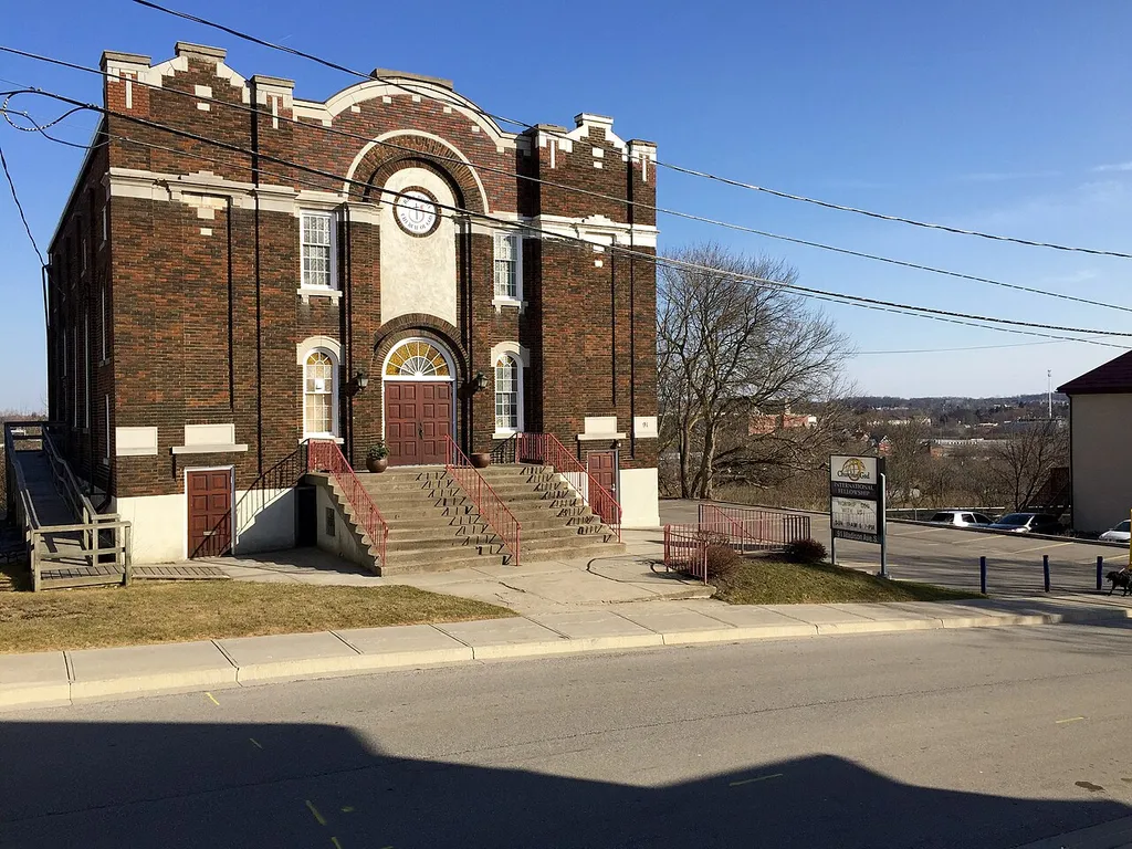 Church on 91 Madison Ave in Kitchener, Ontario. Former synagogue, opened in 1925, sold in 1963 to Zion Mennonite Brethren Church. In 1982. sold at International Fellowship Church of God Kitchener.