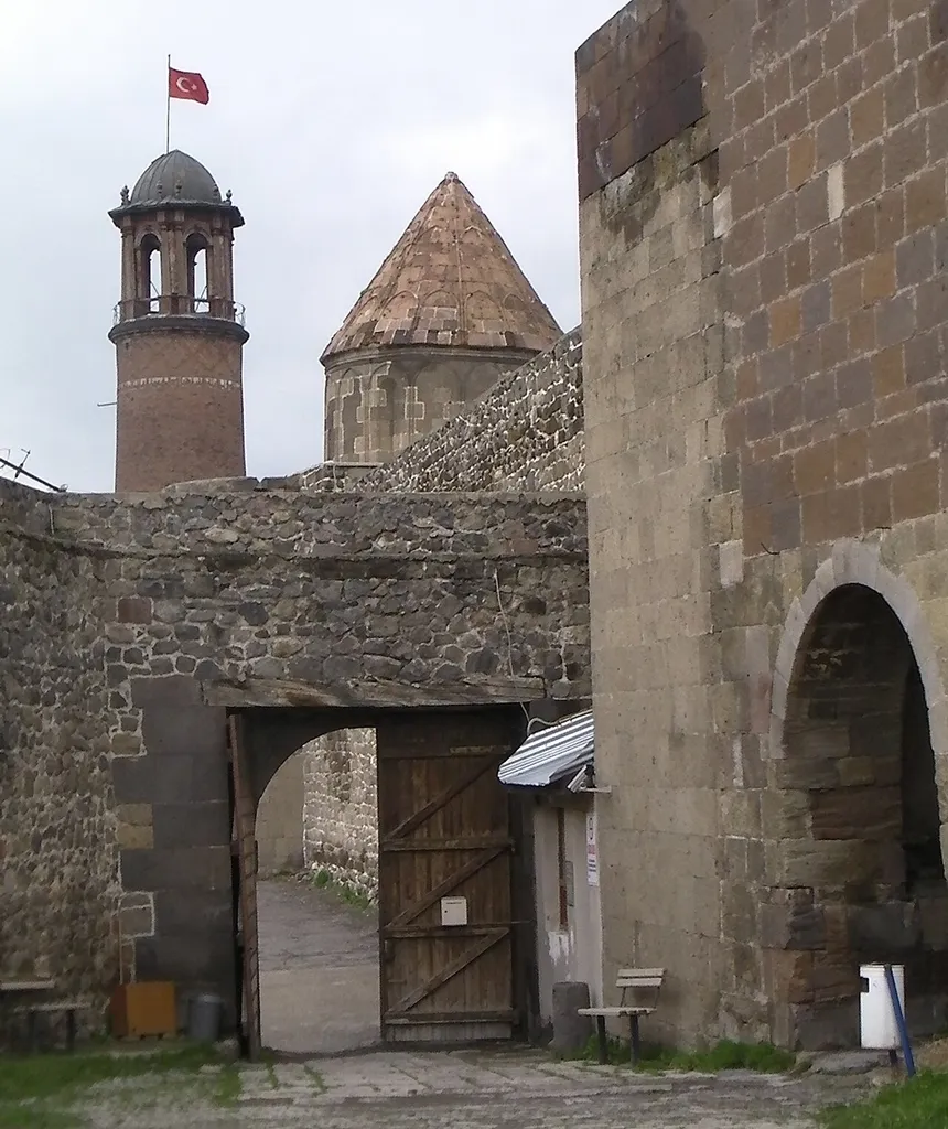 Looking back to the west after entering the area leading to the inner courtyard of the Erzurum Citadel (entrance visible here on the right) in eastern Turkey. Elevation 1926 meters. According to an inscription, the clock tower (Tepsi Minaret) was built by Muzaffer Gazi (1124-1132).