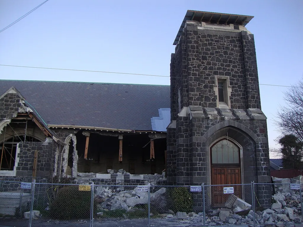 St Mary's Church, Christchurch, with the top half of the tower collapsed.