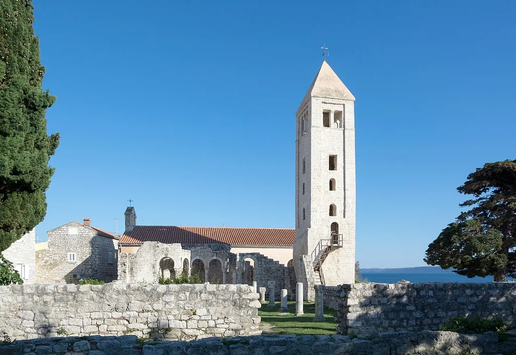 Probably in the 7th century the erection of the Basilika of St. John the Evangelist in Rab was started. But it was abandoned at the end of the 19th century. Only the belfry survived at least as look-out.