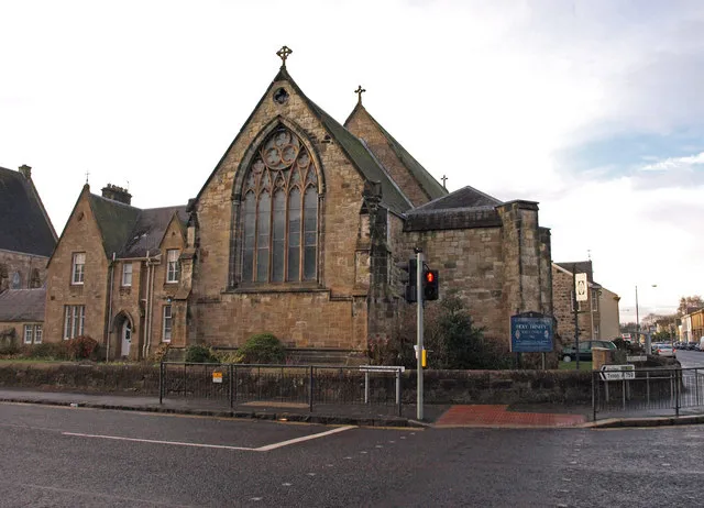 Holy Trinity Scottish Episcopal Church, Kilmarnock. According to a local. The site of the Church and Parsonage were formerly the terminus of the first railway in Scotland, built by the Duke of Portland to transport coal from the mines of Kilmarnock to the pier at Troon for export. I was also told that the railway wagons were horse drawn.[1]
