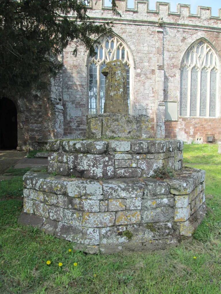 Preaching cross near the south entrance of St Mary's Church, in Silverton, Devon. Fifteenth-century. The upper part of the shaft is missing.