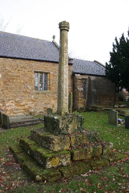 Base and shaft of stone cross in St George's parish churchyard, Bradley, Lincolnshire