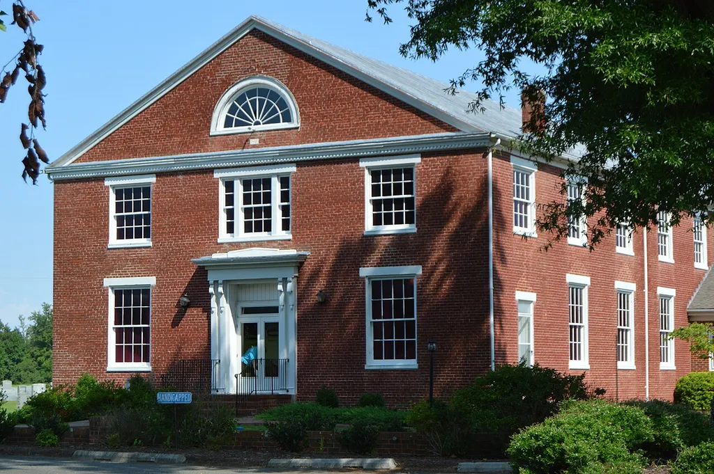 Front and southern side of the Coan Baptist Church, located on Coan Church Road east of Rainswood in Northumberland County, Virginia, United States. Built in 1846, it is listed on the National Register of Historic Places.