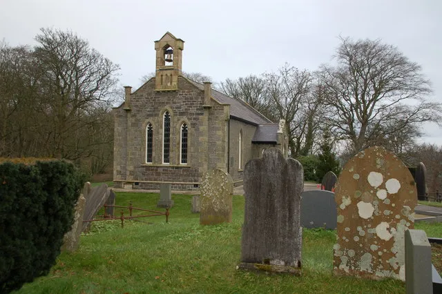 Raloo parish church, Glenoe. Raloo parish church was consecrated in 1842 and restored in 1980. It is at the top of the hill in Glenoe (also "Gleno") and blends well with its surroundings. The waterfall and glen are to the rear. The church shares a minister with St John's, Glynn 162674.