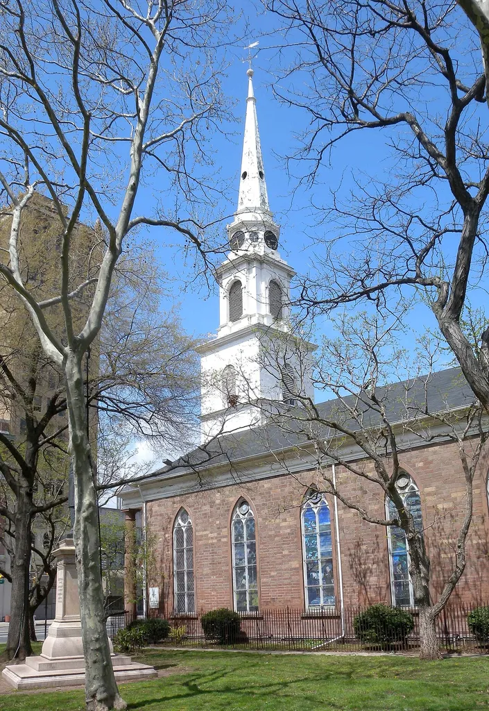 Looking northwest at Trinity &amp; St. Phillip's Episcopal Cathedral in Newark on a sunny midday.}