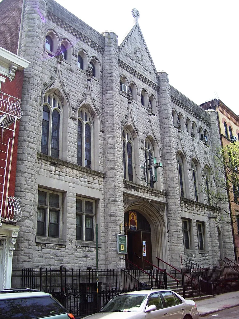 The Cathedral of the Protection of the Holy Virgin, at 59 East 2nd Street between First and Second Avenues, in the East Village neighborhood of Manhattan, New York City, a cathedral of the Diocese of New York and New Jersey of the Orthodox Church in America, was built in 1891, designed by J.C. Cady &amp; Company in the Greek Revival style. It was originally the Olivet Memorial Church, replacing an earlier chapel built by the New York Mission Society in 1867 on the site of what had been a small cemetery. The new building included a library, a gymnasium amd baths. In 1942, the building was sold to the Russian Orthodox Greek Catholic Church of America, and it re-opened in 1943. It is located within the East Village/Lower East Side Historic District (Sources: "East Village/Lower East Side Historic District Designation Report" and From Abyssinian to Zion (2004))