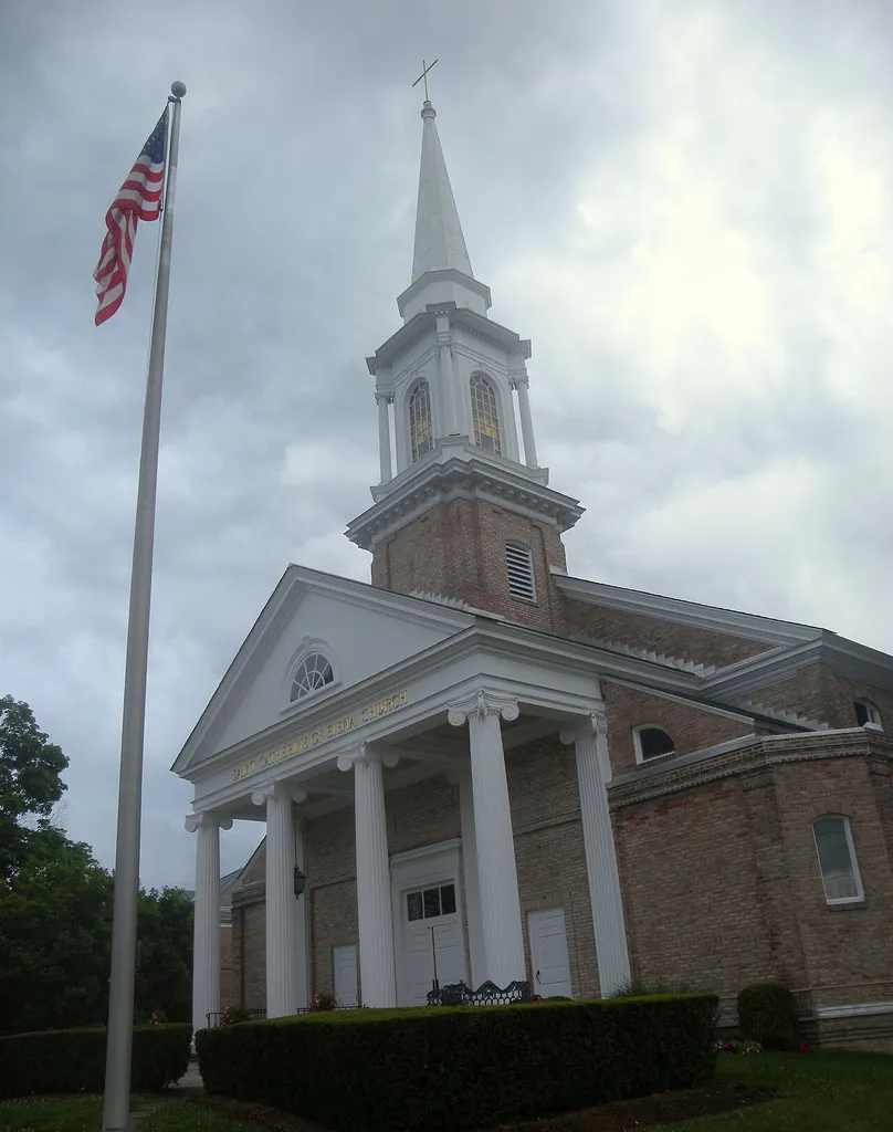 Looking southwest at east façade of St. Catherine of Sienna Church on a rainy afternoon. ZIP 06878.
