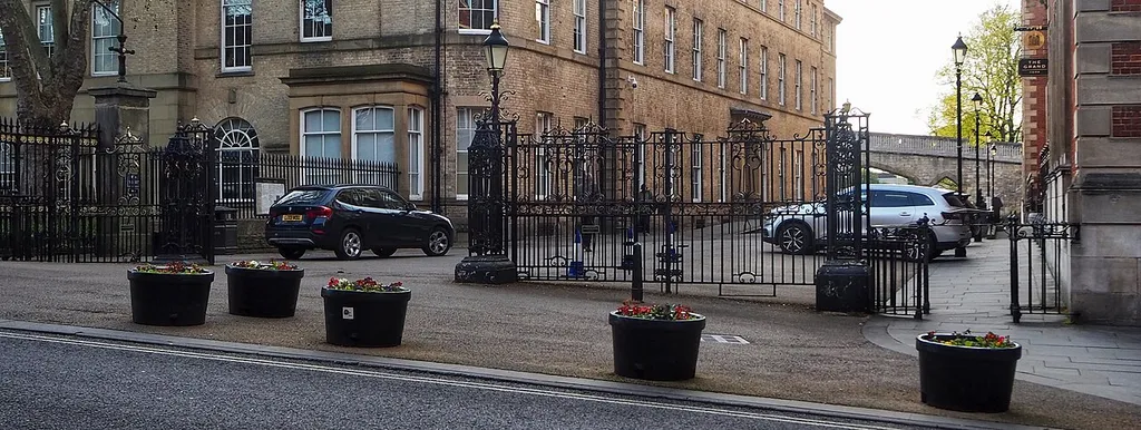 Main gates and wicket gates to former NER company offices, York. c1900. Grade II listed. .mw-parser-output .messagebox{margin:4px 0;width:auto;border-collapse:collapse;border:2px solid var(--border-color-progressive,#6485d1);background-color:var(--background-color-neutral-subtle,#fbfcff);color:var(--color-base,#202122);box-sizing:border-box;border-inline-start-width:8px}.mw-parser-output .messagebox.mbox-small{font-size:88%;line-height:1.25em}.mw-parser-output .mbox-warning,.mw-parser-output .mbox-speedy{border:2px solid var(--border-color-error,#b22222);background:var(--background-color-error-subtle,#ffdbdb);border-inline-start-width:8px}.mw-parser-output .mbox-serious,.mw-parser-output .mbox-delete,.mw-parser-output .mbox-stop{border:2px solid var(--border-color-error,#b22222);border-inline-start-width:8px}.mw-parser-output .mbox-issue,.mw-parser-output .mbox-content{border:2px solid #f28500;background:var(--background-color-warning-subtle,#ffe);border-inline-start-width:8px}.mw-parser-output .mbox-query,.mw-parser-output .mbox-style{border:2px solid #f4c430;background:var(--background-color-warning-subtle,#ffe);border-inline-start-width:8px}.mw-parser-output .mbox-shit{border:2px solid #960;border-inline-start-width:8px}.mw-parser-output .mbox-license{border:2px solid #88a;border-inline-start-width:initial}.mw-parser-output .mbox-legal{border:2px solid var(--border-color-notice,#666);background:var(--background-color-base,#fff);border-inline-start-width:8px}.mw-parser-output .mbox-honor{border:2px solid #ca3;background:var(--background-color-warning-subtle,#fcf4db);border-inline-start-width:8px}.mw-parser-output .mbox-growth{border:2px solid #8d4;background:var(--background-color-success-subtle,#d5fdf4);border-inline-start-width:8px}.mw-parser-output .mbox-move{border:2px solid #93c;border-inline-start-width:8px}.mw-parser-output .mbox-protection,.mw-parser-output .mbox-message{border:2px solid var(--border-color-base,#aaa);border-inline-start-width:8px}.mw-parse
