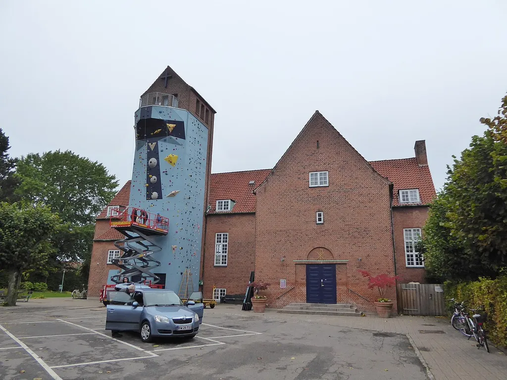 Frederiksholm Kirke at Louis Pios Gade in Kongens Enghave in Copenhagen. The climbing wall on the church tower was added in 2014.