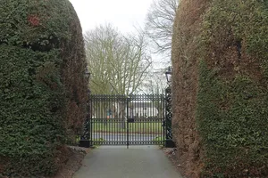 Gates, gate-piers and railings at W entrance to churchyard at Parish Church of St Chad