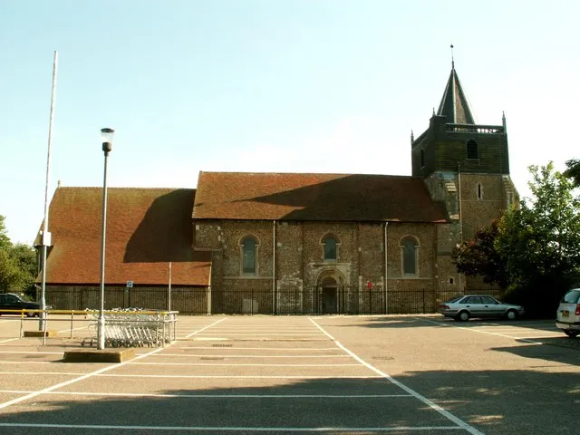 Parish church of St John the Baptist, Great Clacton, Essex, seen from the north from a supermarket car park