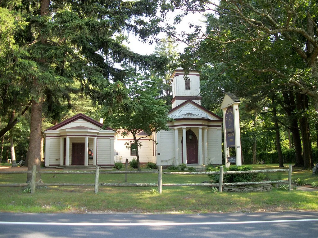 The historic St. Andrew's Episcopal Church (Yaphank, New York) as seen from across East Main Street in Yaphank, New York. I have another shot of the sign for the church.