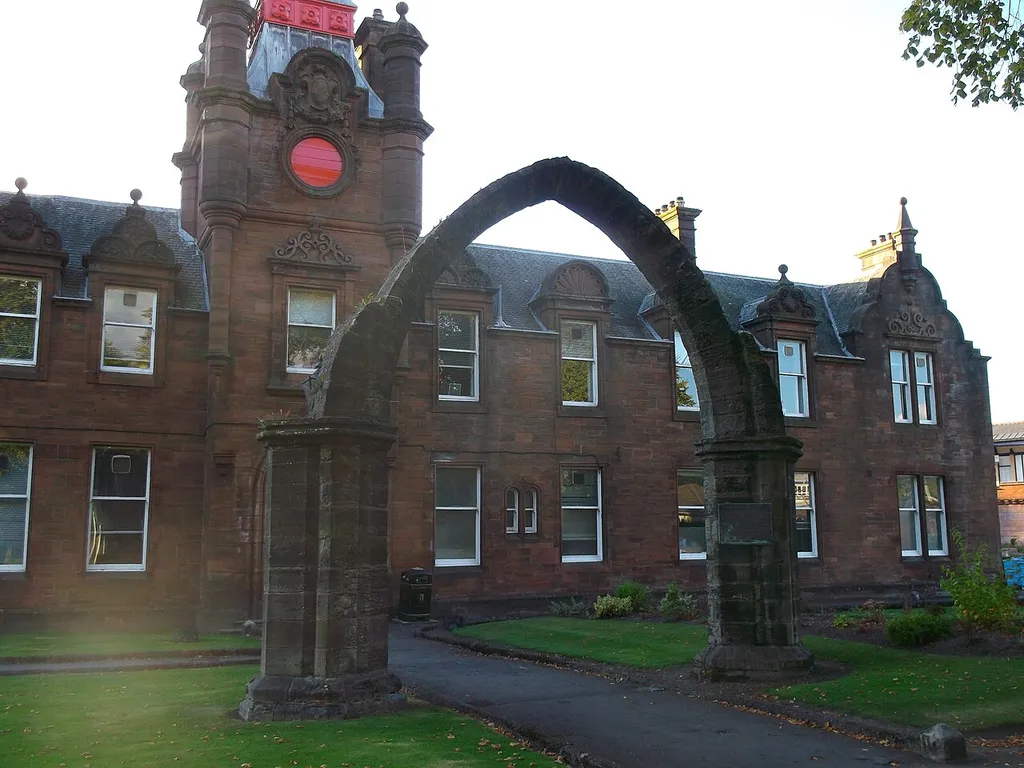DUMBARTON, CHURCH STREET, MUNICIPAL BUILDINGS, COLLEGE BOW Plaque on the Bow says: One of the Tower Arches of St Mary's Collegiate Church Dumbarton. Founded ADMCCCCL by Isabella Countess of Lennox and Duchess of Albany. Its original position was on the site now occupied by the central railway station from which place it was removed in ADMDCCCL to a site in Church Street and again in MDCCCCVII this sole remnant of a once extensive pile was removed to its present position. .mw-parser-output .messagebox{margin:4px 0;width:auto;border-collapse:collapse;border:2px solid var(--border-color-progressive,#6485d1);background-color:var(--background-color-neutral-subtle,#fbfcff);color:var(--color-base,#202122);box-sizing:border-box;border-inline-start-width:8px}.mw-parser-output .messagebox.mbox-small{font-size:88%;line-height:1.25em}.mw-parser-output .mbox-warning,.mw-parser-output .mbox-speedy{border:2px solid var(--border-color-error,#b22222);background:var(--background-color-error-subtle,#ffdbdb);border-inline-start-width:8px}.mw-parser-output .mbox-serious,.mw-parser-output .mbox-delete,.mw-parser-output .mbox-stop{border:2px solid var(--border-color-error,#b22222);border-inline-start-width:8px}.mw-parser-output .mbox-issue,.mw-parser-output .mbox-content{border:2px solid #f28500;background:var(--background-color-warning-subtle,#ffe);border-inline-start-width:8px}.mw-parser-output .mbox-query,.mw-parser-output .mbox-style{border:2px solid #f4c430;background:var(--background-color-warning-subtle,#ffe);border-inline-start-width:8px}.mw-parser-output .mbox-shit{border:2px solid #960;border-inline-start-width:8px}.mw-parser-output .mbox-license{border:2px solid #88a;border-inline-start-width:initial}.mw-parser-output .mbox-legal{border:2px solid var(--border-color-notice,#666);background:var(--background-color-base,#fff);border-inline-start-width:8px}.mw-parser-output .mbox-honor{border:2px solid #ca3;background:var(--background-color-warning-subtle,#fcf4db);border-inline-star