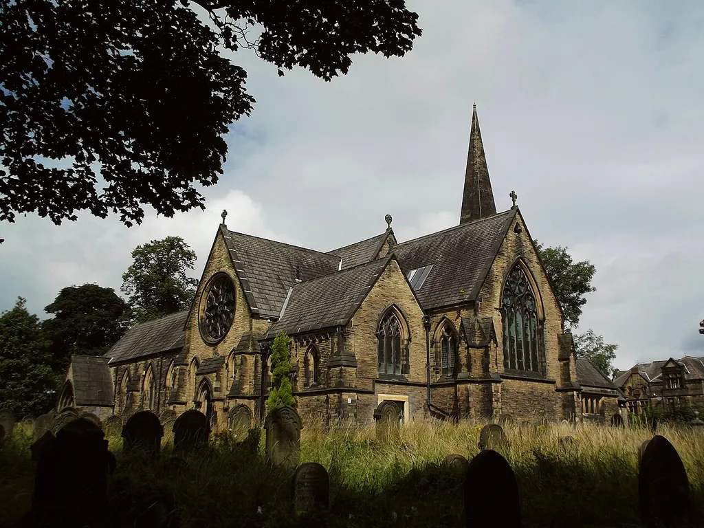 The former church of St Mark, Low Moor, Bradford, West Yorkshire, England, which was designed by Mallinson and Healey, and completed in 1857. Stone carving by Catherine Mawer. Viewed from the south-east.