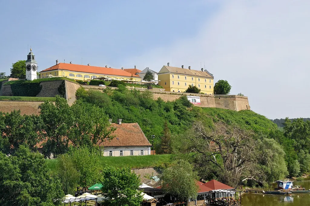 Petrovaradin Fortress is a fortress in Novi Sad, on the right bank of the Danube river. The cornerstone of the present-day southern part of the fortress was laid on October 18, 1692. Petrovaradin Fortress has many underground tunnels as well (16 km of underground countermine system). Recent archeological discoveries have offered a new perspective not only on the history of Petrovaradin, but on the entire region. At the Upper Fortress, the remains of an earlier Paleolithic settlement dating from 19,000 to 15,000 BC has been discovered. With this new development it has been established that there has been a continuous settlement at this site from the Paleolithic age to the present. During the excavations carried out in 2005, archeologists also discovered another significant find. Examining remains from the early Bronze age (c. 3000 BC), ramparts were discovered which testify that already at that time a fortified settlement existed at the Petrovaradin site.
