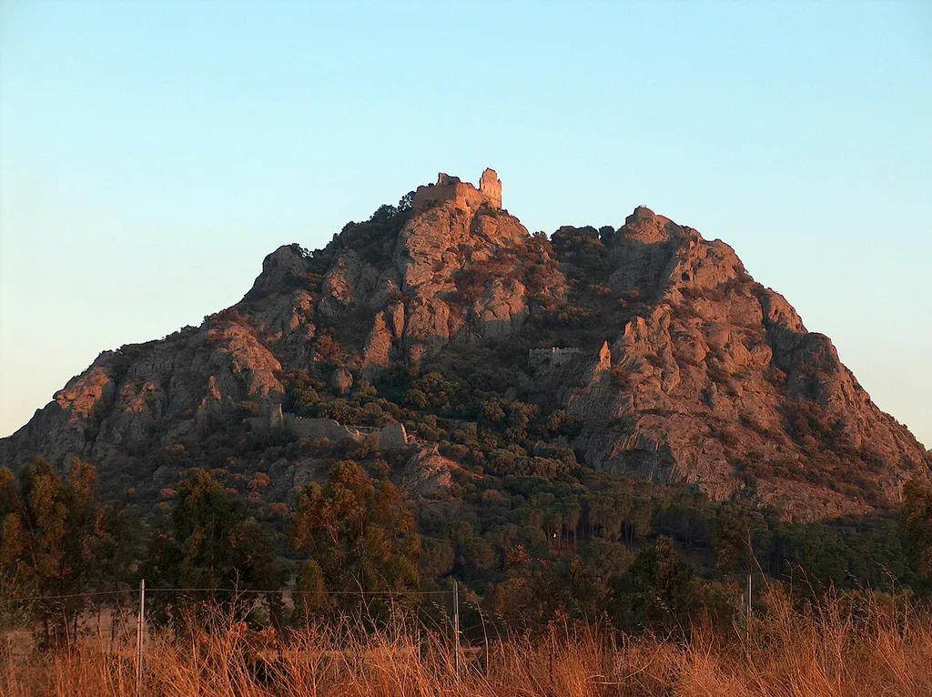 Andesitic dome of Acquafredda and ruins of medieval castle (Siliqua, Sardinia, Italy)