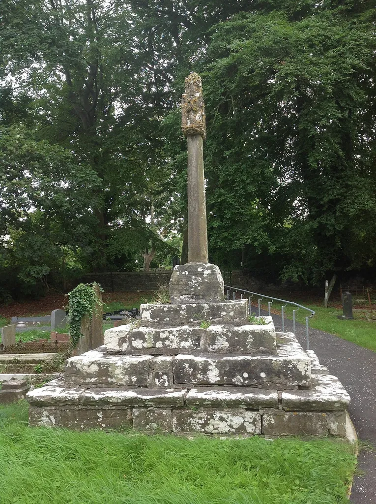Church Cross at St Canna's Church in Llangan. Showing four step base with cross-shaft and scuptured head, possibly 15th century.