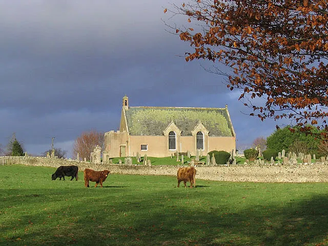 Eckford Parish Church Stands on the site of a church granted to Jedburgh Abbey in the early 13th century. The church was burnt by the English army in 1544, and it is said that the church bell was removed to either Norham Church or Carham Church in Northumberland. The present day church was built between 1665 and 1668. The north aisle was added in 1722 and further alterations took place in 1774 and 1898. There is a small belfry with a bell and outside chain on the west gable. (Source: The Churches and Graveyards of Roxburghshire by G.A.C.Binnie). Viewed from the A698 just outside the square.
