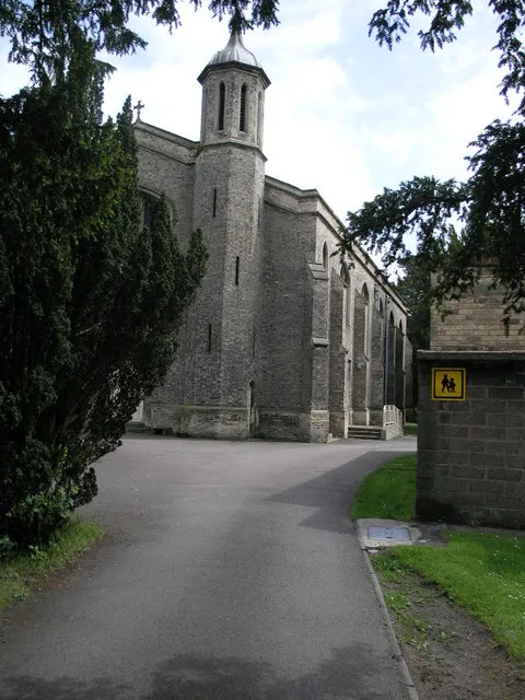 Part of St Saviour's parish church, Retford, Nottinghamshire, seen from the west. One of its pair of octagonal west turrets is visible.