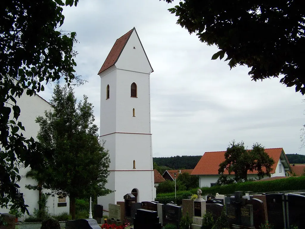 Gerzen, Lichtenhaag, Pfarrer-Grabinger-Weg 1. Turm der ehemaligen Kirche St. Nikolaus. Massiv mit Satteldach, 15. Jahrhundert. Der quadratische Turm steht frei ein paar Meter südöstlich der Kirche. Er hat vier Geschosse, wovon die zwei unteren durch Absetzen gekennzeichnet sind. Rundbogiger Eingang von Süden. Spitzbogige Schlitzfensterchen im 2. und 3. Geschoss. Spitzbogige Schallfenster nach vier Seiten im oberen Doppelgeschoss. Beim Neubau der Kirche 1959-1960 wurden vom historischen Turm das Friesgesims, die vier Giebel und der Spitzhelm mit Kreuz entfernt und mit einem Satteldach dem neu gebauten westlich stehenden Turm angeglichen. In den meisten Abbildungen, auch beim Landesamt für Denkmalpflege wird fälschlicherweise das Foto des westlich stehenden, neuen Turms gezeigt.