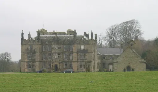 Chipchase Castle (grid reference NY882757) is a 17th century Jacobean mansion incorporating a substantial 14th century pele tower which stands north of Hadrian's Wall, near Wark on Tyne, between Bellingham and Hexham in Northumberland.