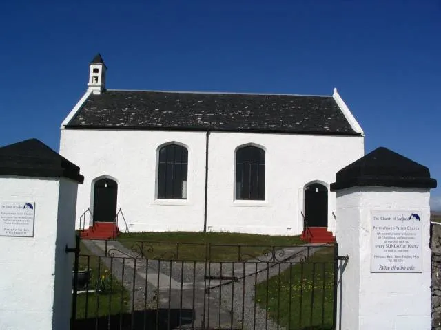 Church at the head of the harbour, Portnahaven The church at the head of the harbour is interesting for having two doors, one was intended for the use of the people of Portnahaven on the left, the other for the residents of Port Wemyss.