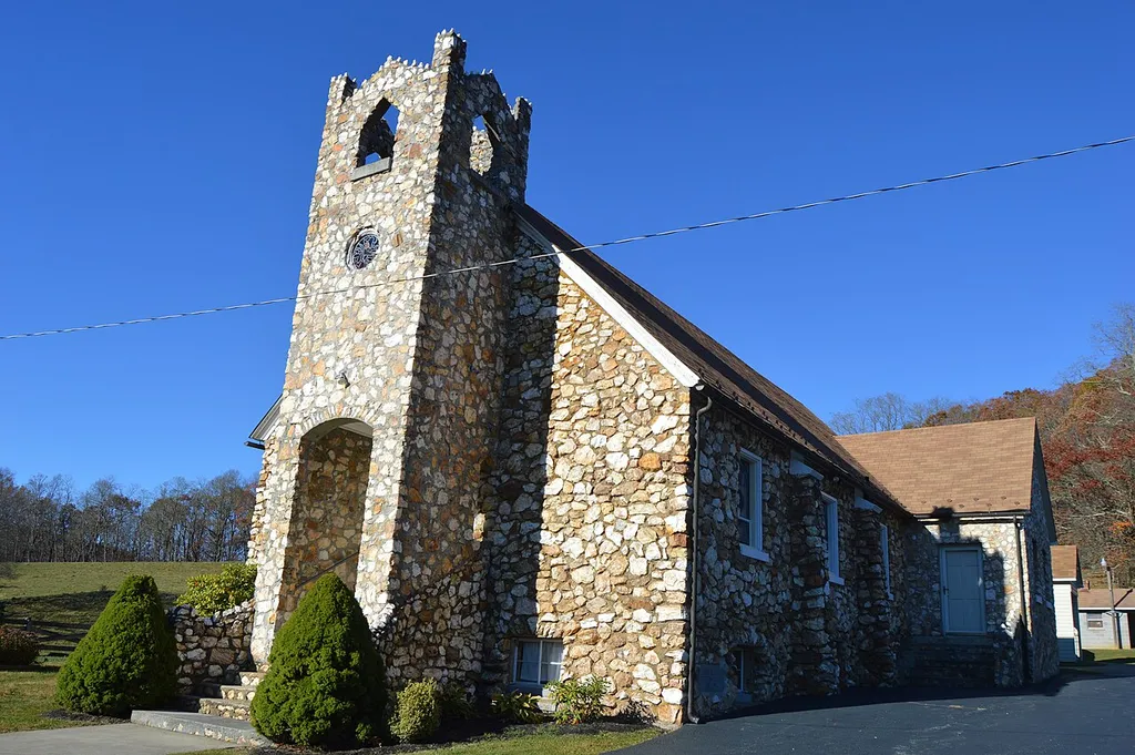 Front and eastern side of Slate Mountain Presbyterian Church, located on Rock Church Road near the summit of the Blue Ridge (at Rock Castle Gap) in far eastern Floyd County, Virginia, United States. Built in 1932, it is listed on the National Register of Historic Places.
