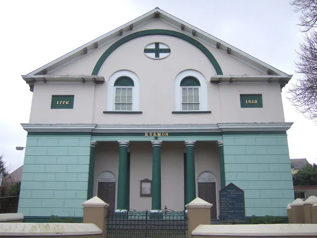 Hermon Baptist Chapel An impressive chapel in the High Street with a strikingly original facade, built in 1832 (the other date 1776 presumably represents an earlier foundation). The subtle dark and light green colour scheme enhances the classical simplicity of the architecture.
