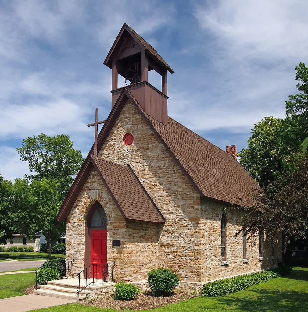 Church of the Redeemer, Cannon Falls, Minnesota, USA. Shot from the southwest on a stepstool. This is an image of a place or building that is listed on the National Register of Historic Places in the United States of America. Its reference number is 80002040 (Wikidata).