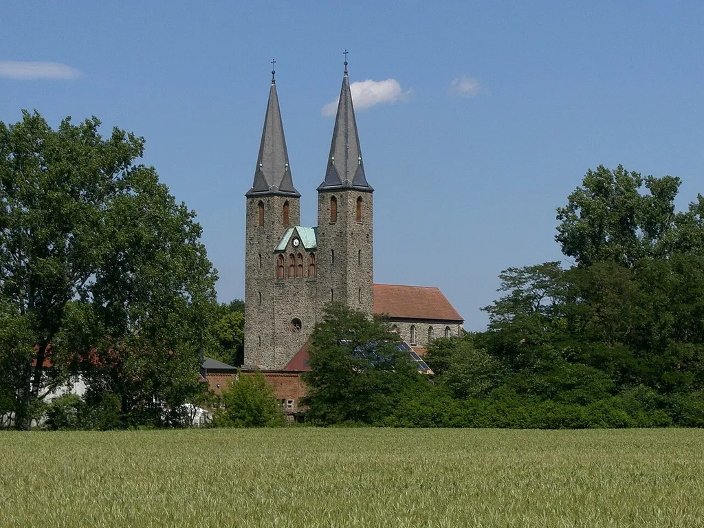 St. Laurentius Church of former Benedictine nuns monastery in Hillersleben as seen across the Ohre river, Saxony-Anhalt, Germany
