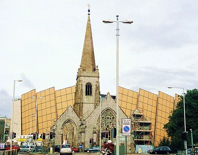 Drake Circus shopping centre behind the ruined Charles Church, Plymouth, England.