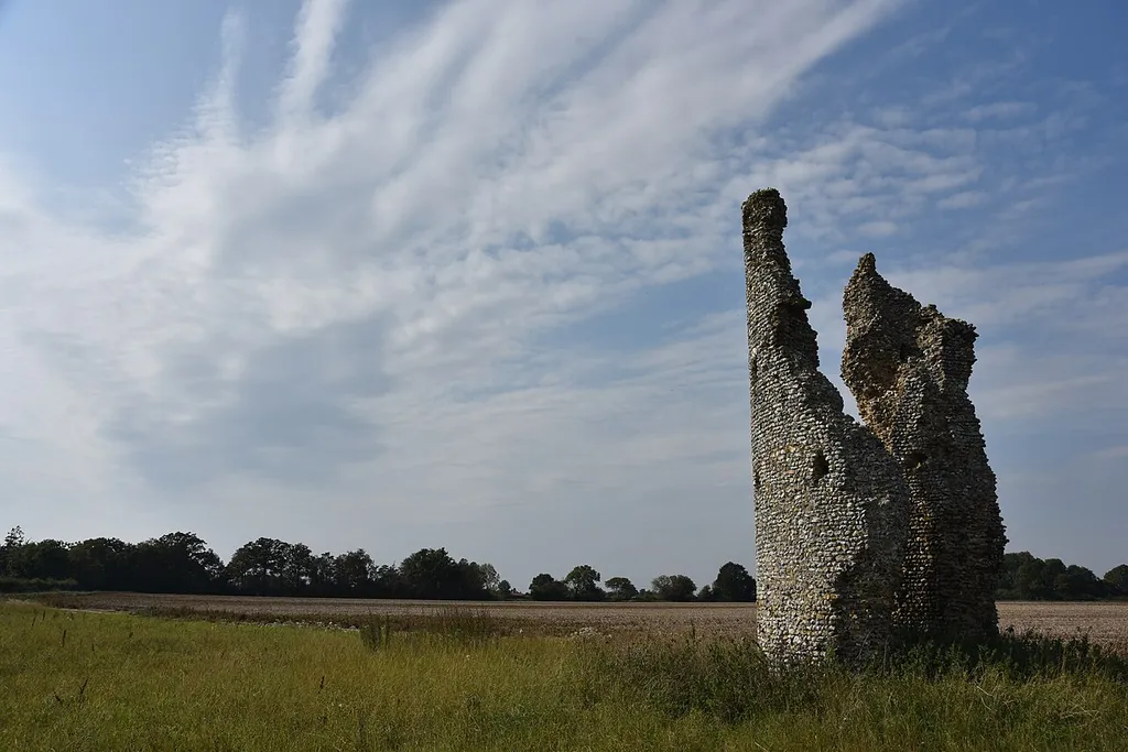 Remains of Church of St Mary, Thorpe Parva. The church dates from the 12th century and only the remains of the tower survive. There are two columns built of flint rubble. .mw-parser-output .messagebox{margin:4px 0;width:auto;border-collapse:collapse;border:2px solid var(--border-color-progressive,#6485d1);background-color:var(--background-color-neutral-subtle,#fbfcff);color:var(--color-base,#202122);box-sizing:border-box;border-inline-start-width:8px}.mw-parser-output .messagebox.mbox-small{font-size:88%;line-height:1.25em}.mw-parser-output .mbox-warning,.mw-parser-output .mbox-speedy{border:2px solid var(--border-color-error,#b22222);background:var(--background-color-error-subtle,#ffdbdb);border-inline-start-width:8px}.mw-parser-output .mbox-serious,.mw-parser-output .mbox-delete,.mw-parser-output .mbox-stop{border:2px solid var(--border-color-error,#b22222);border-inline-start-width:8px}.mw-parser-output .mbox-issue,.mw-parser-output .mbox-content{border:2px solid #f28500;background:var(--background-color-warning-subtle,#ffe);border-inline-start-width:8px}.mw-parser-output .mbox-query,.mw-parser-output .mbox-style{border:2px solid #f4c430;background:var(--background-color-warning-subtle,#ffe);border-inline-start-width:8px}.mw-parser-output .mbox-shit{border:2px solid #960;border-inline-start-width:8px}.mw-parser-output .mbox-license{border:2px solid #88a;border-inline-start-width:initial}.mw-parser-output .mbox-legal{border:2px solid var(--border-color-notice,#666);background:var(--background-color-base,#fff);border-inline-start-width:8px}.mw-parser-output .mbox-honor{border:2px solid #ca3;background:var(--background-color-warning-subtle,#fcf4db);border-inline-start-width:8px}.mw-parser-output .mbox-growth{border:2px solid #8d4;background:var(--background-color-success-subtle,#d5fdf4);border-inline-start-width:8px}.mw-parser-output .mbox-move{border:2px solid #93c;border-inline-start-width:8px}.mw-parser-output .mbox-protection,.mw-parser-output .mbox-message{bord