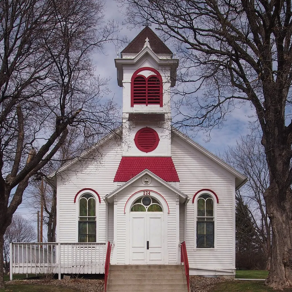 Norwood Methodist Episcopal Church, 224 Hill St, Norwood Young America, Minnesota, USA. Viewed from the south-southwest. This is an image of a place or building that is listed on the National Register of Historic Places in the United States of America. Its reference number is 80001978 (Wikidata).