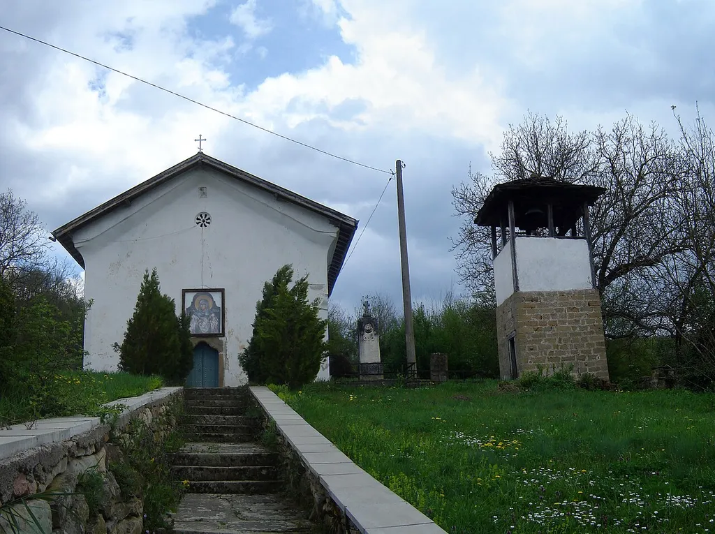 The Church of Saint Petka in Bozhenitsa, Bulgaria and the bell tower.