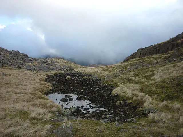 The Dry Tarn just of the Breast Route path from Styhead Tarn to Great Gable