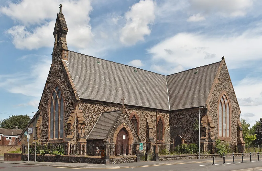 West end with bell cote, and south side of Holy Trinity, Fingerpost.