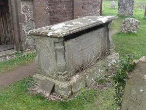 William Price Memorial approximately 2 meters south of chancel of Church of St Mary and St David