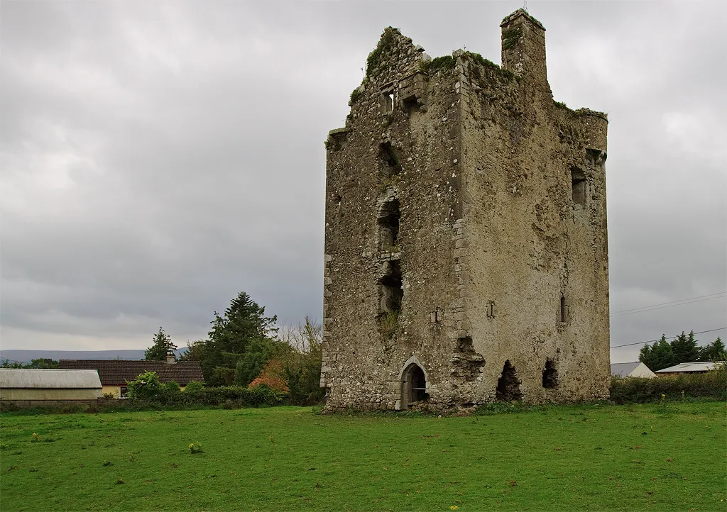Castles of Munster: Knockgraffon, Tipperary. North of the River Suir is Knockgraffon Castle which stands less than 2 km to the west of a comparatively new M8 motorway. This is a C16 Butler tower having circular bartizans on the NW and SE corners and an east facing entrance doorway.