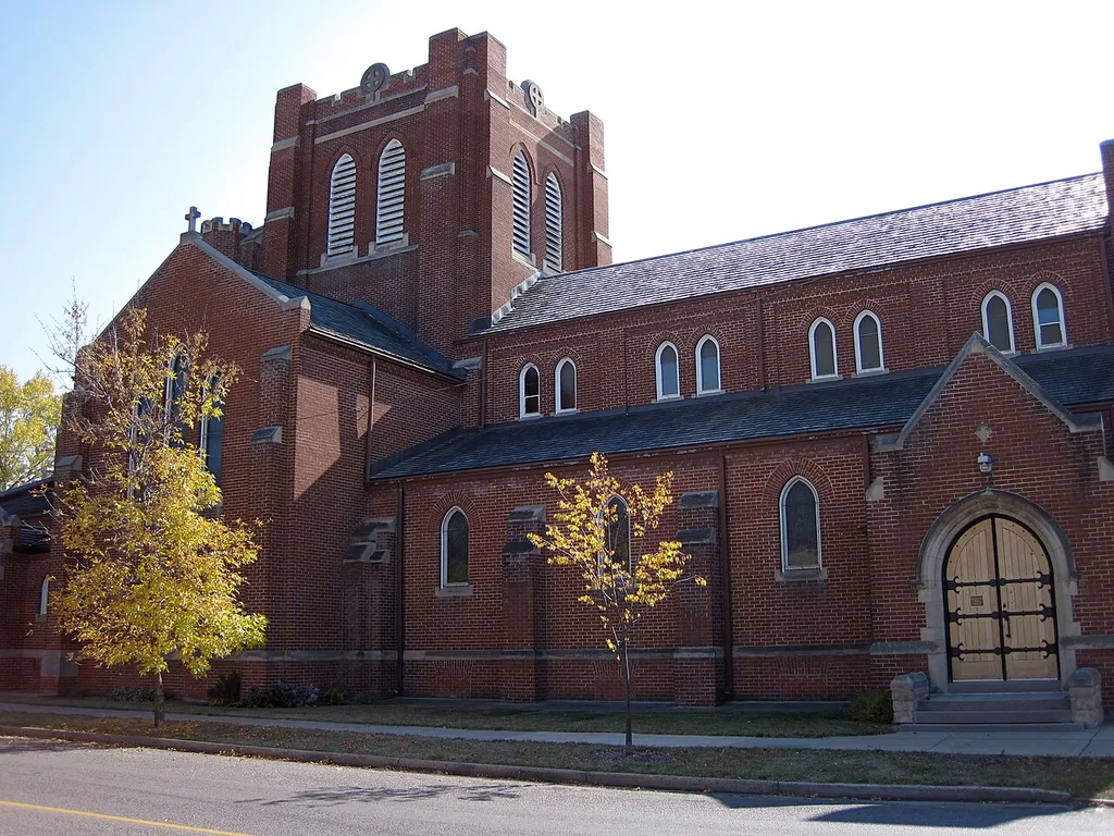 St. Matthew's Anglican Cathedral, a Gothic Revival-style church completed in 1913. At Louise Avenue and 13th St. in Brandon, Manitoba. Photo taken from the north side of Louise Ave.