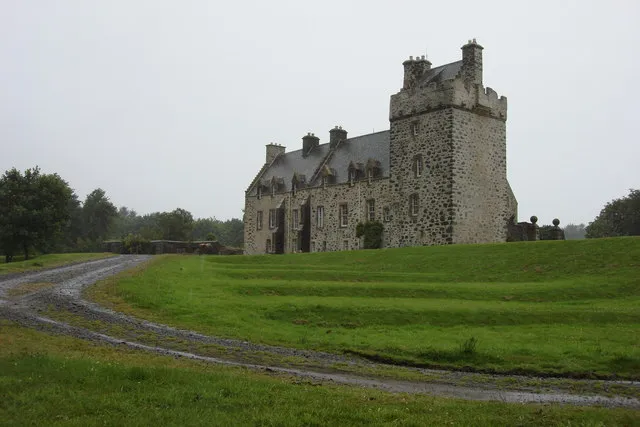 Lochnaw Castle Lochnaw Castle (in the pouring rain), home (once upon a time) of the Agnew family. The oldest bit is the tall tower, which is 16th century. It was an hotel for a while, but had stopped being so when I arrived there to stay recently! It is now a private home again (with a very long and muddy drive!).