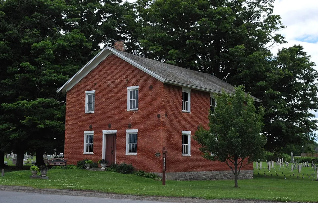 BUILT IN 1824-1826 TO SERVE THE AREAS FIRST BAPTIST SOCIETY AND SERVED AS A HOUSE OF WORSHIP UNTIL 1926.