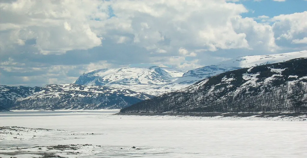 Strandavatnet was frozen even end of May (2013). The view however is as always extraordinary, fascinating, because of the mountains on the background. They belong to National Park Hallingskarvet.