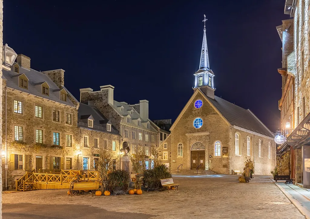 Place Royale in the Lower Town of Quebec City, with the church of Notre-Dame-des-Victoires, begun in 1687 on the site of the Abitation founded by Champlain in 1608. Quebec City, Quebec, Canada.