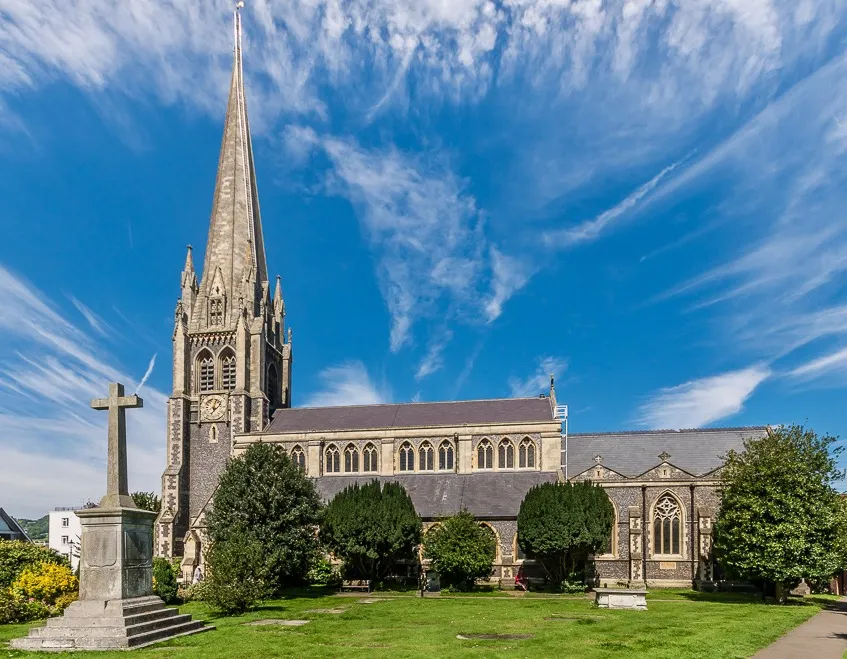 St Martin's Church, Dorking was built in 1868-77 by Henry Woodyer. Its spire is the tallest in Surrey.