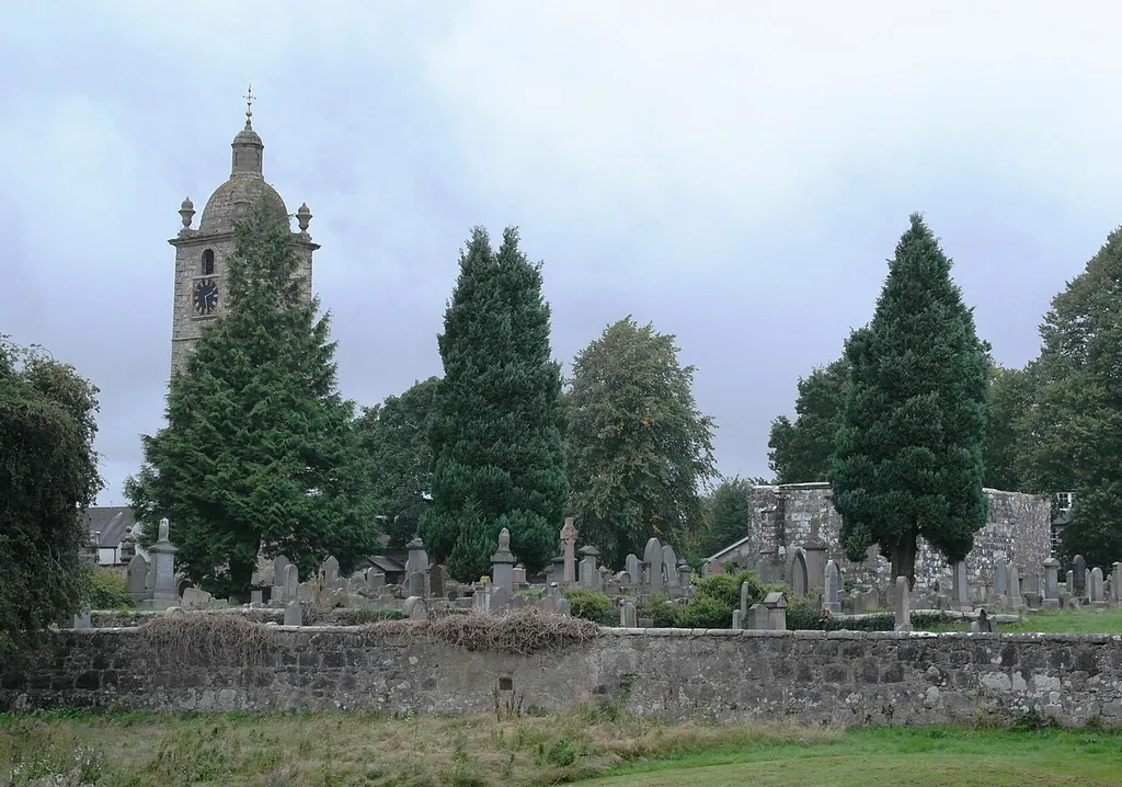 Photograph showing the tower and chancel of St Ninians Kirk (LB41095) and the Kirkyard (LB41096)