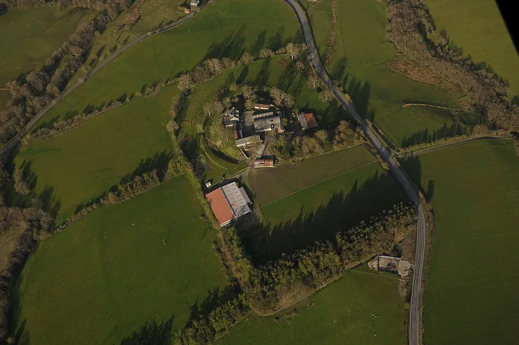 Colwyn Castle near Hundred House, Powys. The Roman Fort in which the later castle was built is clearly visible, as is the castle earthworks.